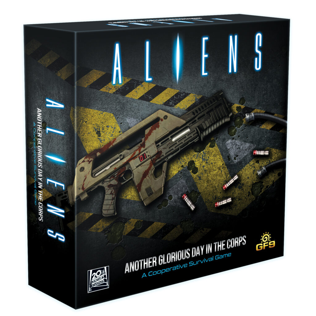 Aliens: Another Glorious Day in the Corps box art featuring a blood-spattered M56 Pulse Rifle and expended grenade rounds. 